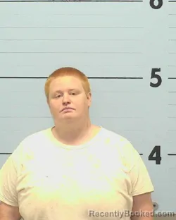 Mugshot of ADRIENNE NICOLE SNOW booked in Burke County, North Carolina on March 27, 2026