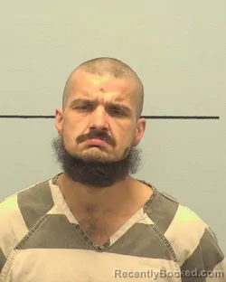 Mugshot of JONATHAN LEROY POPLIN booked in Burke County, North Carolina on March 7, 2026