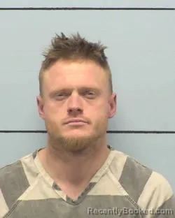 Mugshot of JOHN WAYNE DOSTER