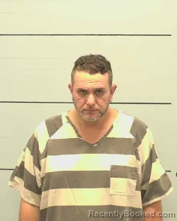 Mugshot of MOSTAFA HASSAN A WALY booked in Burke County, North Carolina on April 2, 2026