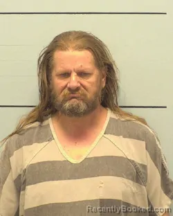 Mugshot of DOUGLAS DILLARD MOORE booked in Burke County, North Carolina on March 7, 2026