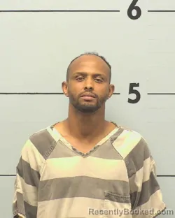 Mugshot of ABDIMAJID IBRAHAIM HASSAN booked in Burke County, North Carolina on July 11, 2026