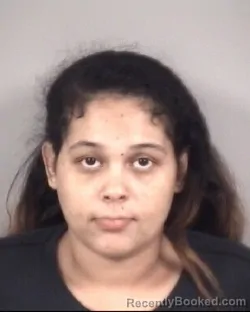 Mugshot of ASHA SHARIF ALI booked in Cabarrus County, North Carolina on April 18, 2026