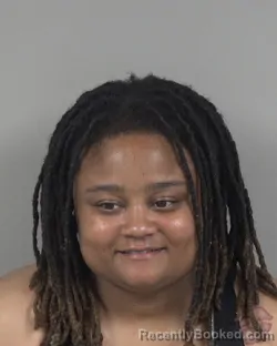 Mugshot of Cimona Shontrikia Harrell booked in Cabarrus County, North Carolina on September 12, 2026