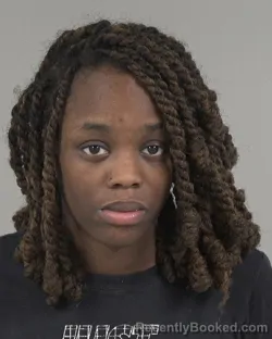 Mugshot of COURTNEY CHARZELLE HOWARD booked in Cabarrus County, North Carolina on April 15, 2026