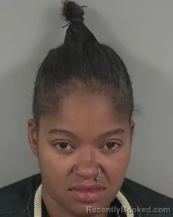 Mugshot of Aquisha Dominique Tolbert booked in Cabarrus County, North Carolina on October 25, 2026