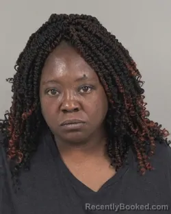 Mugshot of ADRIENNE SHANNAE REID booked in Cabarrus County, North Carolina on May 31, 2026