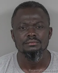 Mugshot of AKWASI ATTA booked in Cabarrus County, North Carolina on April 8, 2026