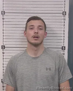 Mugshot of DYLAN SHANE REED booked in Caldwell County, North Carolina on March 23, 2026