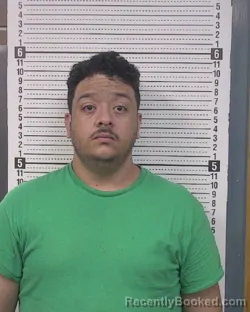 Mugshot of Josue Francisco Flores Funez booked in Caldwell County, North Carolina on August 6, 2026