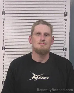 Mugshot of ELLIOT PATRICK COX booked in Caldwell County, North Carolina on March 20, 2026