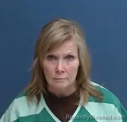 Mugshot of Charmine Elizabeth Dregalla booked in Teller County, Colorado on June 13, 2026