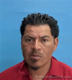 Mugshot of Julian Amador Y Amador booked in Desoto County, Florida on July 19, 2026