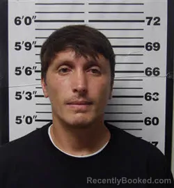 Mugshot of JOHN GABRIEL AGUON booked in Carteret County, North Carolina on July 9, 2026