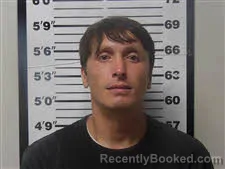 Mugshot of JOHN GABRIEL AGUON booked in Carteret County, North Carolina on July 25, 2026