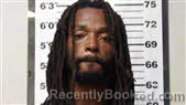 Mugshot of KIM EUGENE HARKLEY booked in Carteret County, North Carolina on April 14, 2026