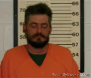 Mugshot of JUSTIN TOMMIE BOONE booked in Caswell County, North Carolina on July 5, 2026