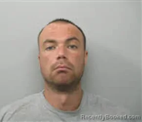 Mugshot of Travis Earl Pugh booked in Chatham County, North Carolina on August 27, 2026
