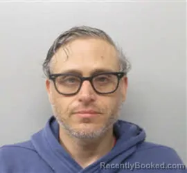 Mugshot of JOHN-PAUL OMIHINSKI booked in Chatham County, North Carolina on March 8, 2026