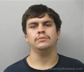 Mugshot of Huxley Alfredo Solis booked in Chatham County, North Carolina on September 14, 2026