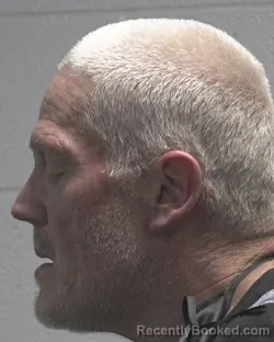 Mugshot of JOHN WAYNE DOSTER