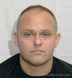 Mugshot of JOHN E TATE