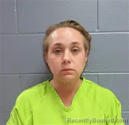 Mugshot of KIMBERLY ANN EVANS booked in Lee County, Georgia on April 15, 2026