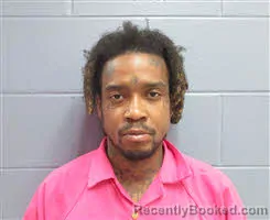 Mugshot of MALCOLM JAMAL BROWN booked in Lee County, Georgia on April 21, 2026