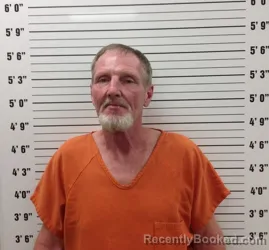 Mugshot of TRAVIS RHODES booked in Pickens County, Georgia on April 1, 2026