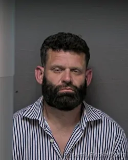 Mugshot of JOHN WILLIAM BROWN