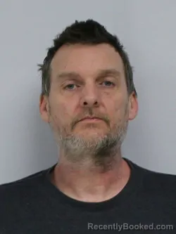 Mugshot of TRAVIS RAY HEDRICK