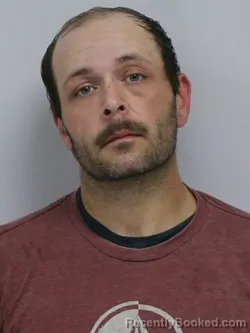 Mugshot of JUSTIN DAVID LEONARD booked in Davie County, North Carolina on March 31, 2026