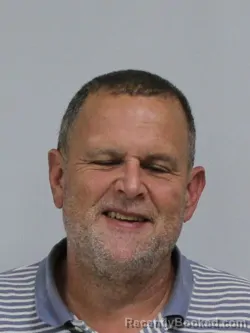 Mugshot of TIMOTHY TRAVIS GREENWOOD booked in Davie County, North Carolina on April 16, 2026
