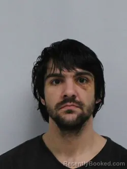 Mugshot of ALEXANDER AUGUSTUS SIMCOX booked in Davie County, North Carolina on April 30, 2026