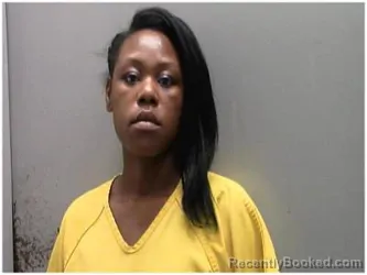 Mugshot of ASHLEY LATOYA MOORE booked in Edgecombe County, North Carolina on March 23, 2026