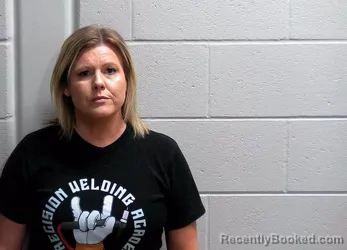 Mugshot of NICOLE DENISE RADNOVICH booked in Bureau County, Illinois on April 18, 2026