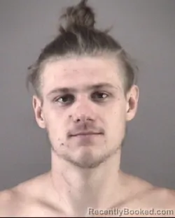 Mugshot of Austin Douglas Simpson booked in Forsyth County, North Carolina on July 12, 2026