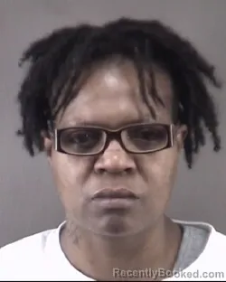 Mugshot of DECEMBER THOMAS