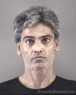 Mugshot of Faisal Warriach Raza booked in Forsyth County, North Carolina on September 10, 2026