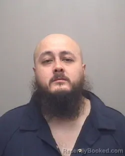 Mugshot of Giovanni Edir Reynoso