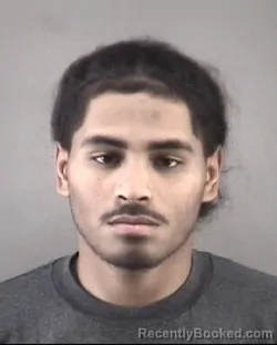 Mugshot of JUSTIN GARCIAOLMEDO