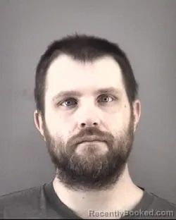 Mugshot of JUSTIN ANDREW MOORE