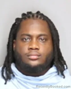Mugshot of Abdulraheem Ayodeji Adeyombo booked in Champaign County, Illinois on October 3, 2026
