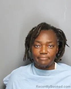 Mugshot of Gertrude Kabongo Tshinguta booked in Champaign County, Illinois on September 17, 2026