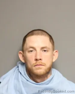 Mugshot of AARON MICHAEL DUVALL booked in Champaign County, Illinois on April 28, 2026