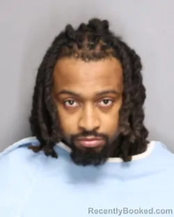 Mugshot of CAMAAR JAMAL BELK booked in Champaign County, Illinois on May 10, 2026