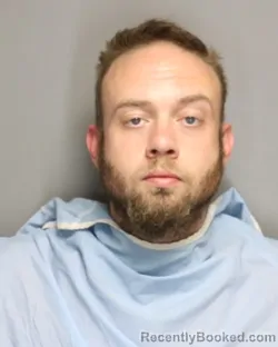 Mugshot of RYAN MICHAEL BRUCKER booked in Champaign County, Illinois on May 11, 2026