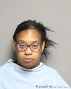Mugshot of CHARNA LEE NEVILLES booked in Champaign County, Illinois on May 12, 2026