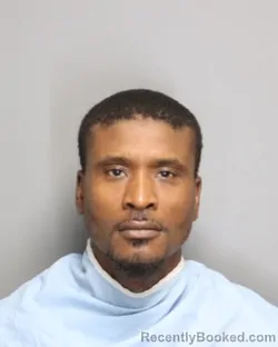 Mugshot of MAURICE DIONZAY BROWN booked in Champaign County, Illinois on May 12, 2026