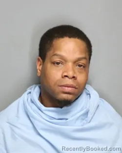 Mugshot of PIERRE DECARLOS RENFRO booked in Champaign County, Illinois on May 13, 2026
